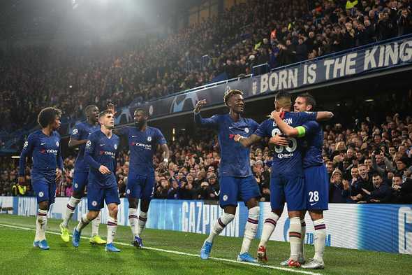 Chelsea's Spanish defender Cesar Azpilicueta (R) celebrates with teammates after scoring their second goal during the UEFA Champion's League Group H football match between Chelsea and Lille at Stamford Bridge in London on December 10, 2019. (Photo by Glyn KIRK / AFP)